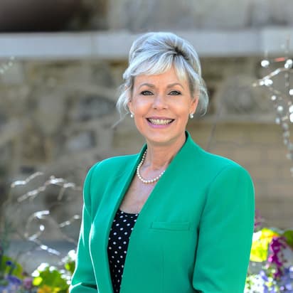 Headshot of Althea in the Leadership Center Courtyard 