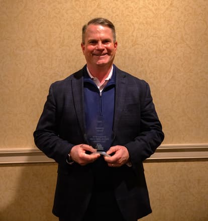 Rob holding BIA award 